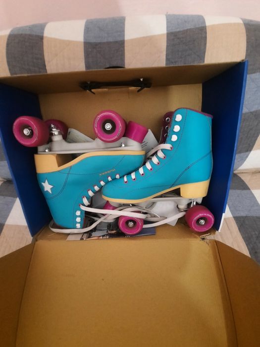 Роликовые коньки