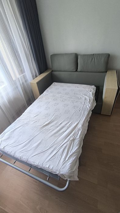 Разгъваем диван за хол