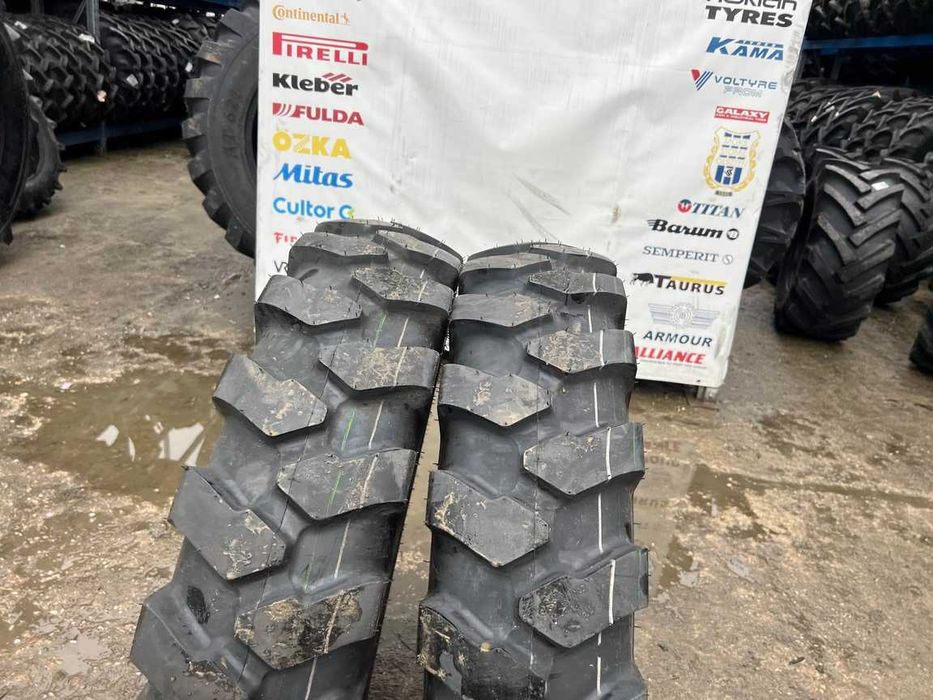 Cauciucuri noi 10.00-20 cu 16 pliuri marca BKT pentru excavator