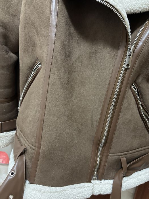 Теплая дубленка.