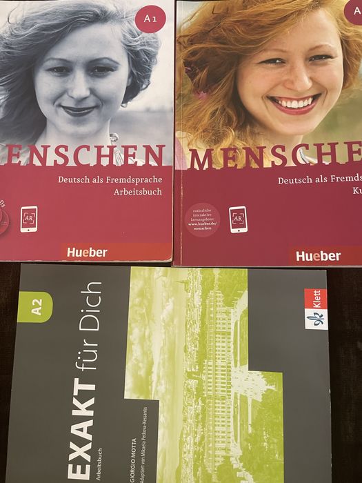 Учебник и тетрадка по немски А1