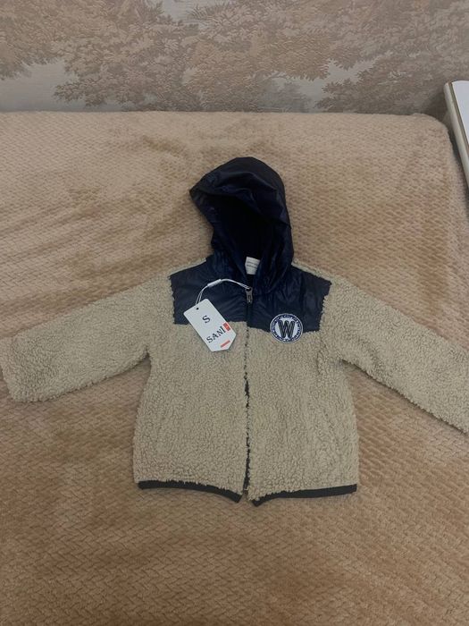 Детские вещи на новорождённых