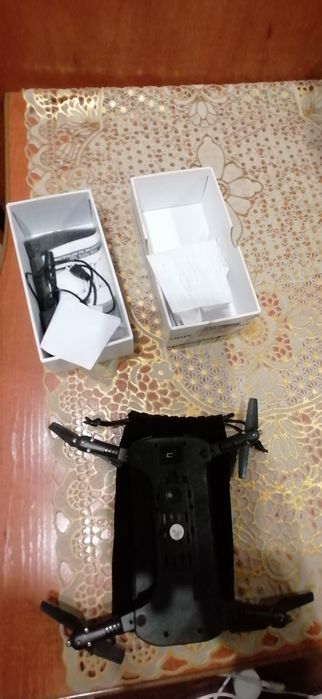 Квадрокоптер с Ладонь