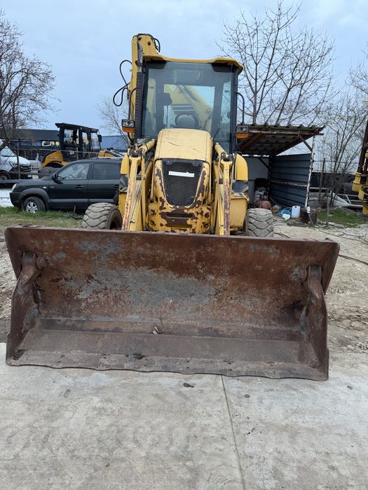 De vanzare buldoexcavator komatsu 2011