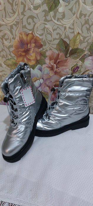 Новые  зимние сапоги