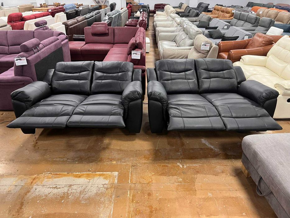 Черни кожени дивани две двойки с релаксиращ механизъм