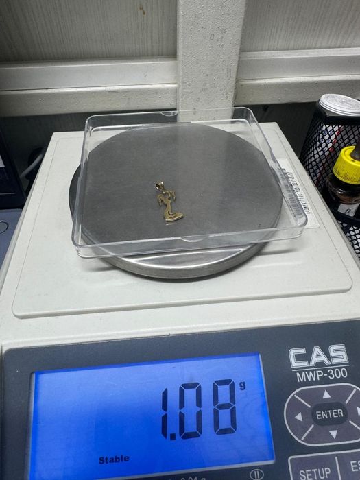 Кулон мать и ребёнок.