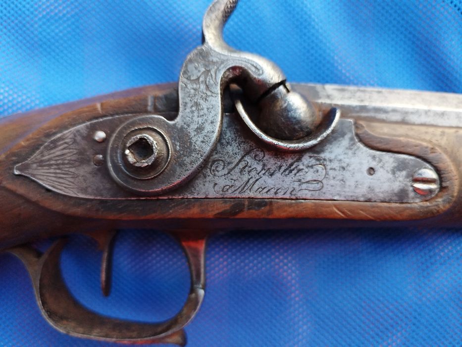 Стар капсулен пищов.