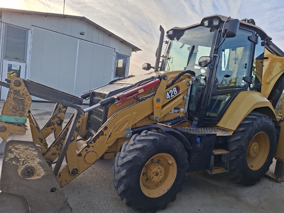 De vanzare buldoexcavator Caterpillar 428