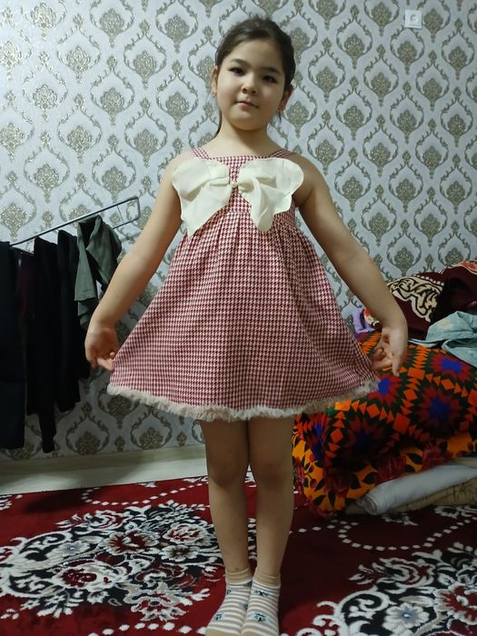 Детский платье россиский ,шикарный.для взрослих тоже есть одежда .100%