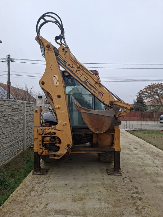 Vînd buldo escavator case 590  sle adus recent iitalia