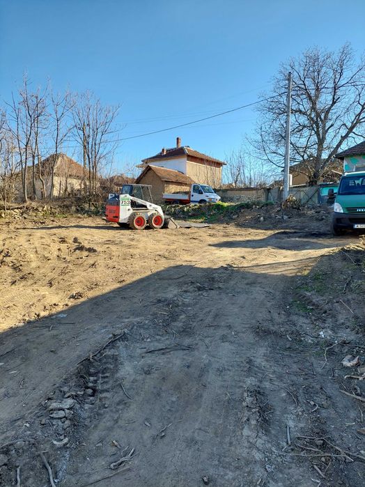 Услуги с Бобкат мини багер и самосвал.