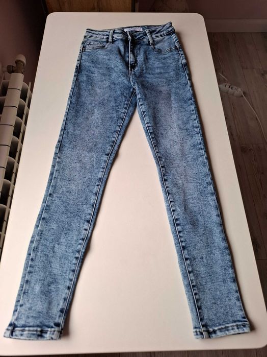 Чисто нови , дамски еластични слим дънки - размер 27 с повдигащ ефект