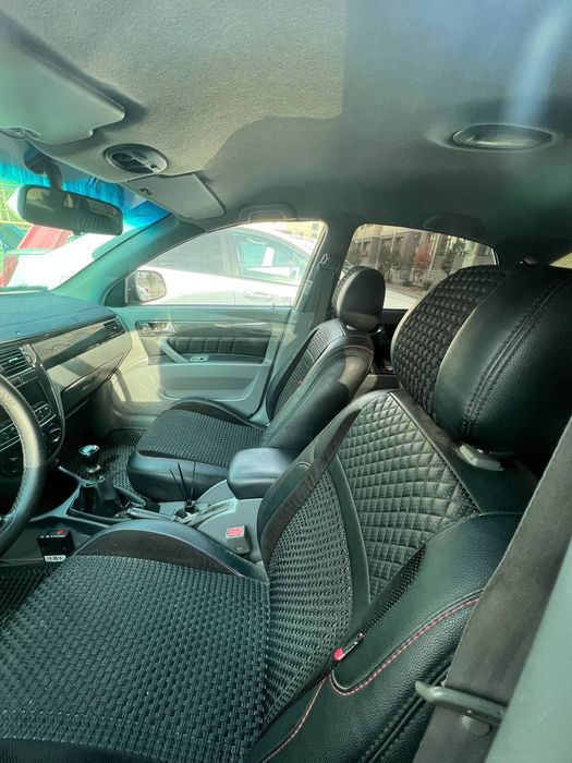 Ласетти 1,8 100 % жентра қилинган ичларигача наваротлари қилинган