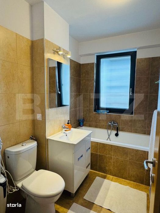 Apartament 3 camere, decomandat, etaj intermediar, lift, parcare si bo