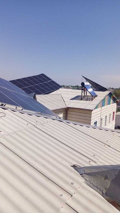 Quyosh panellari o'rnatish. Установка солнечных панелей