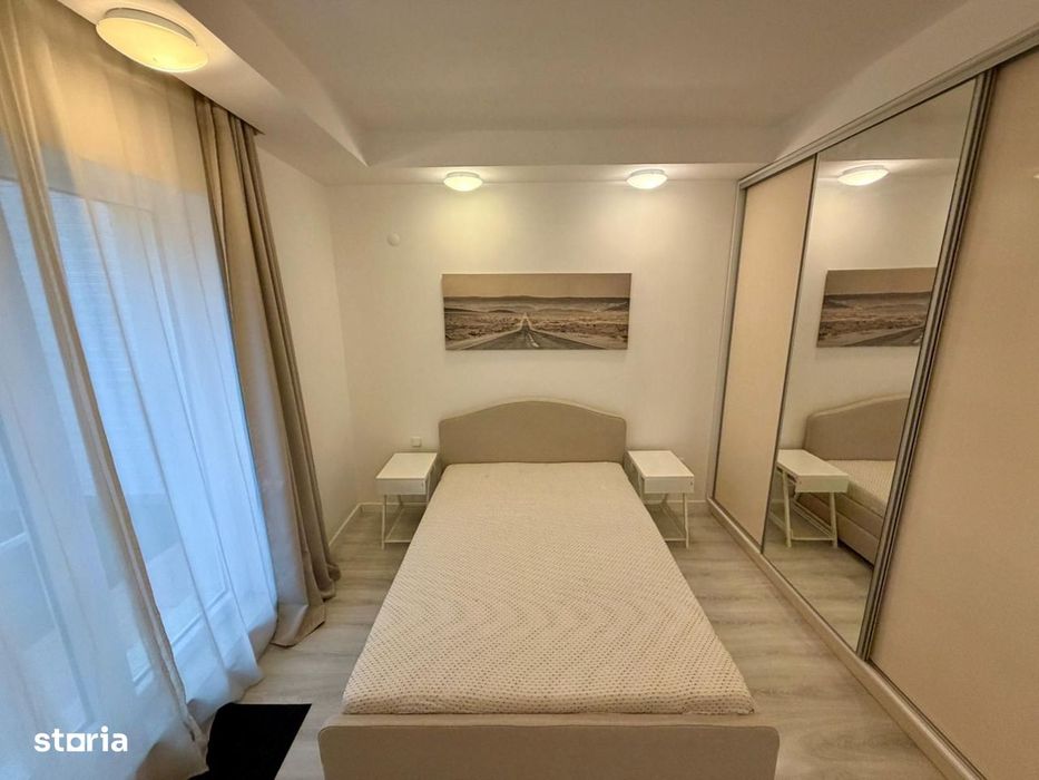 COSMOPOLIS - Apartament cu 3 camere si gradina, mobilat si utilat.