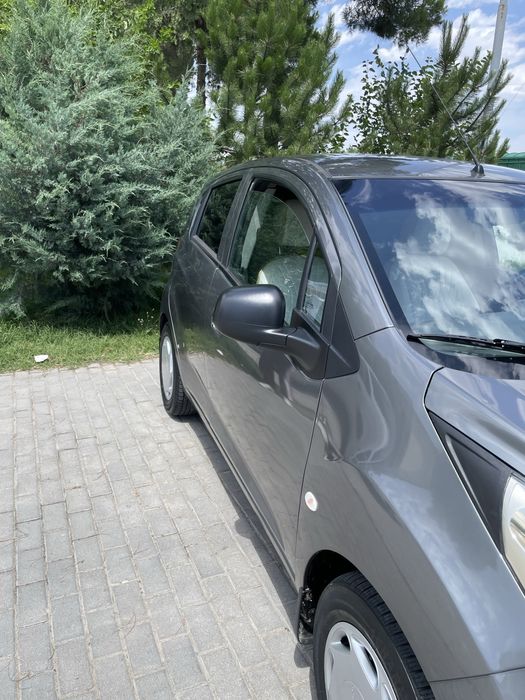 Спарк яхши холатда сотилади ,111000 пробег пропанда
