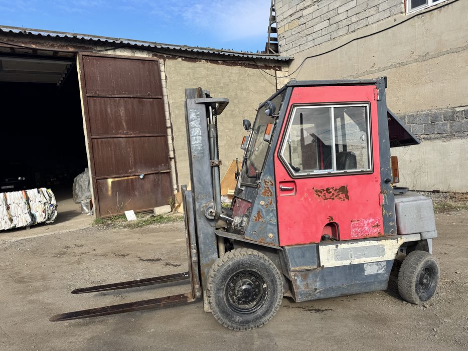 Продам погрущик nissan j01A15