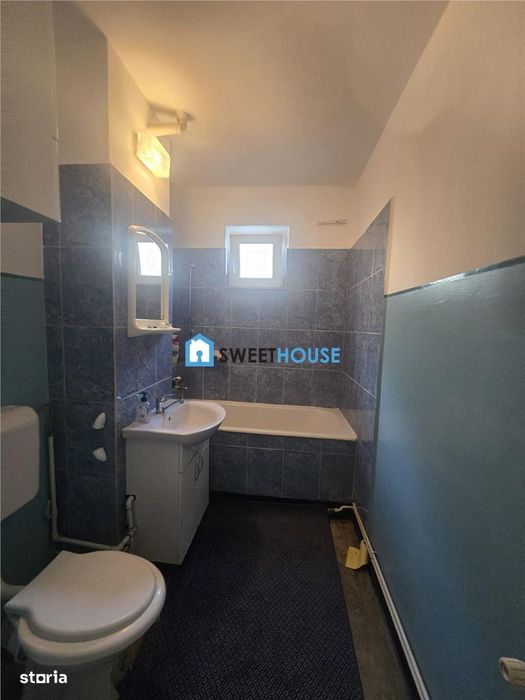 Apartament cu trei camere parter