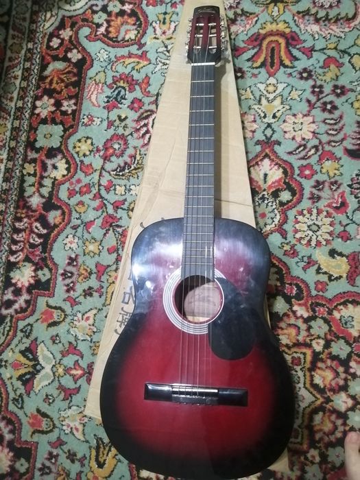 Гитара новая совсем