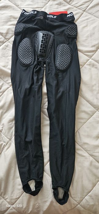 Pantaloni moto .