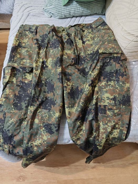 Камуфлажни дрехи