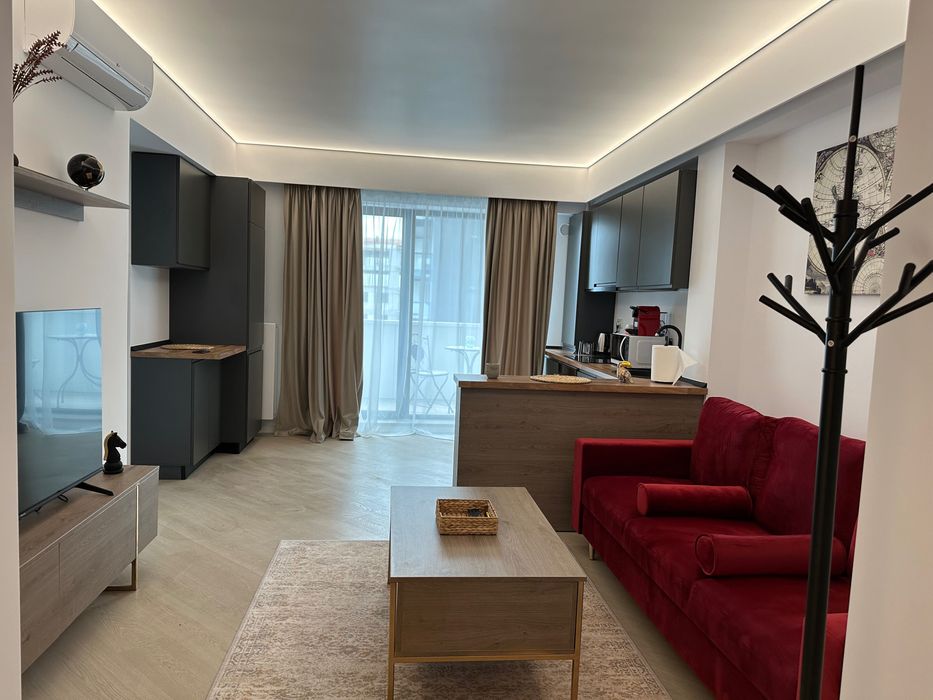 Apartament cu 2 camere de închiriat în Cortina North, cu un loc de parcare subteran.
