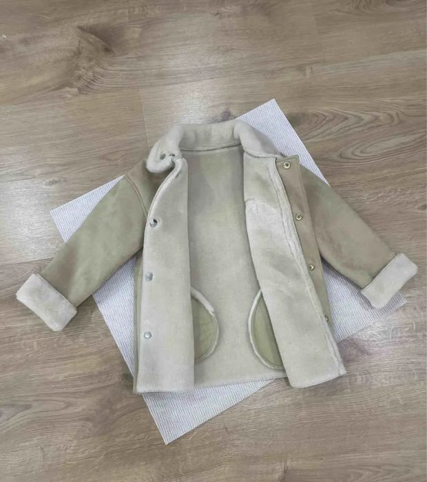 Продам новую детскую дубленку