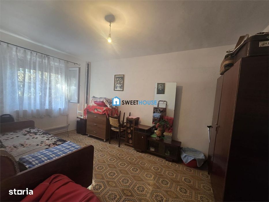 Apartament cu trei camere parter