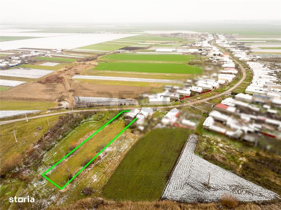 RECO . Teren intravilan cu hala metalica in Roit .