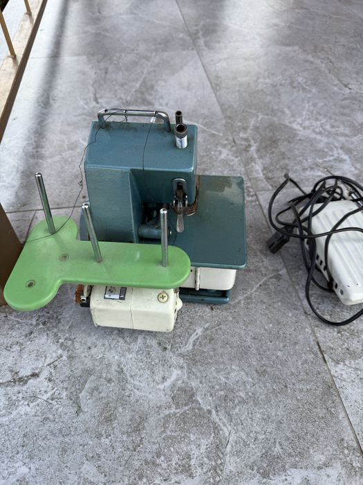 Оверлок швейная машина