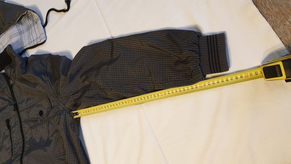 Двулицева връхна дреха