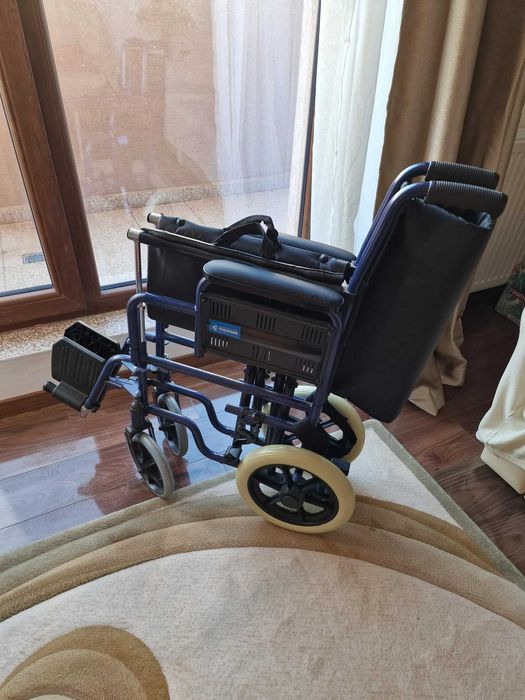 Scaun cu rotile pliant ptr transport varstnici sau dizabili - ca nou !