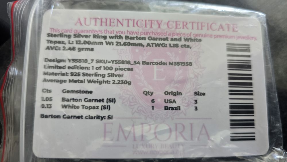 Inel de argint cu granat si topaz alb