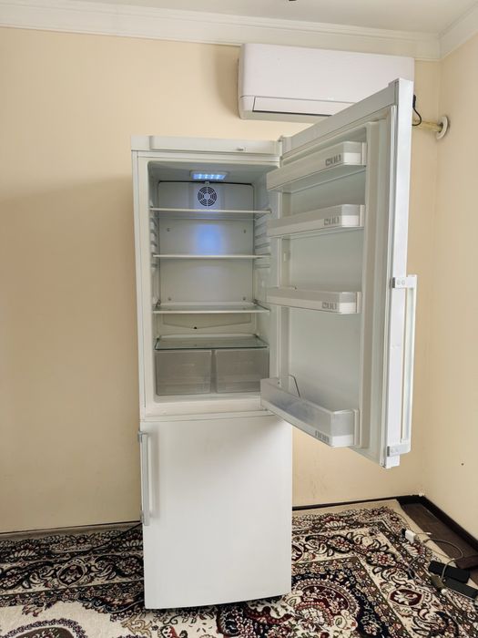 Artel holadilnik rabochi