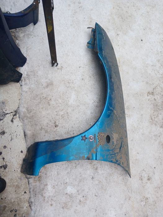 Крыло Мазда MX3 привозное