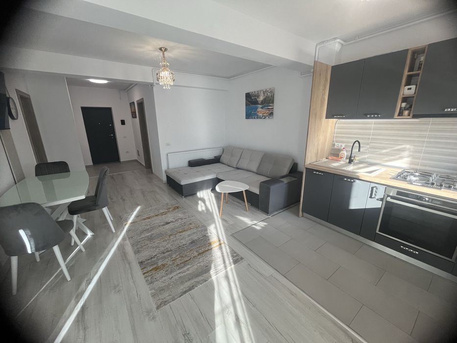 Inchiriez Ap 2 camere , 65 m2 , bloc nou , garaj privat   subsol