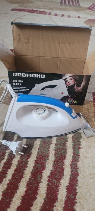 Утюг электрический.