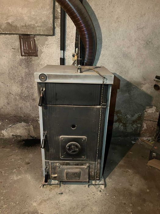 Котел на твърдо гориво с възможност за инсталиране горелка за пелети