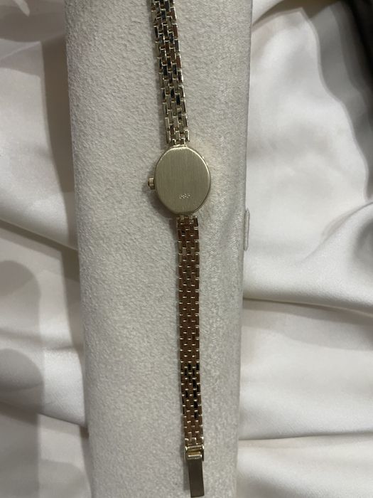 Золотые часы женские