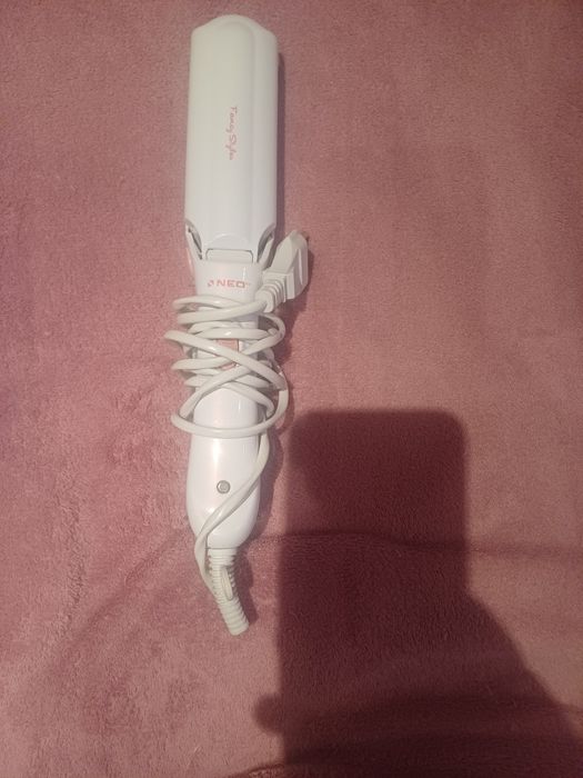 Преса за изправяне на коса