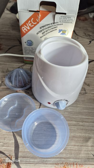 Уред за затопляне на бебешки шишета