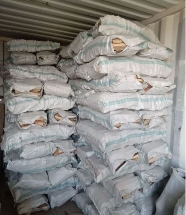 Дрова в мешках.