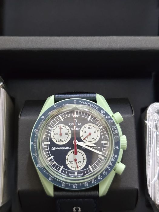 Swatch omega mission to люкс