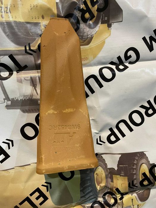 Зубья,адаптеры,фиксаторы,коронки