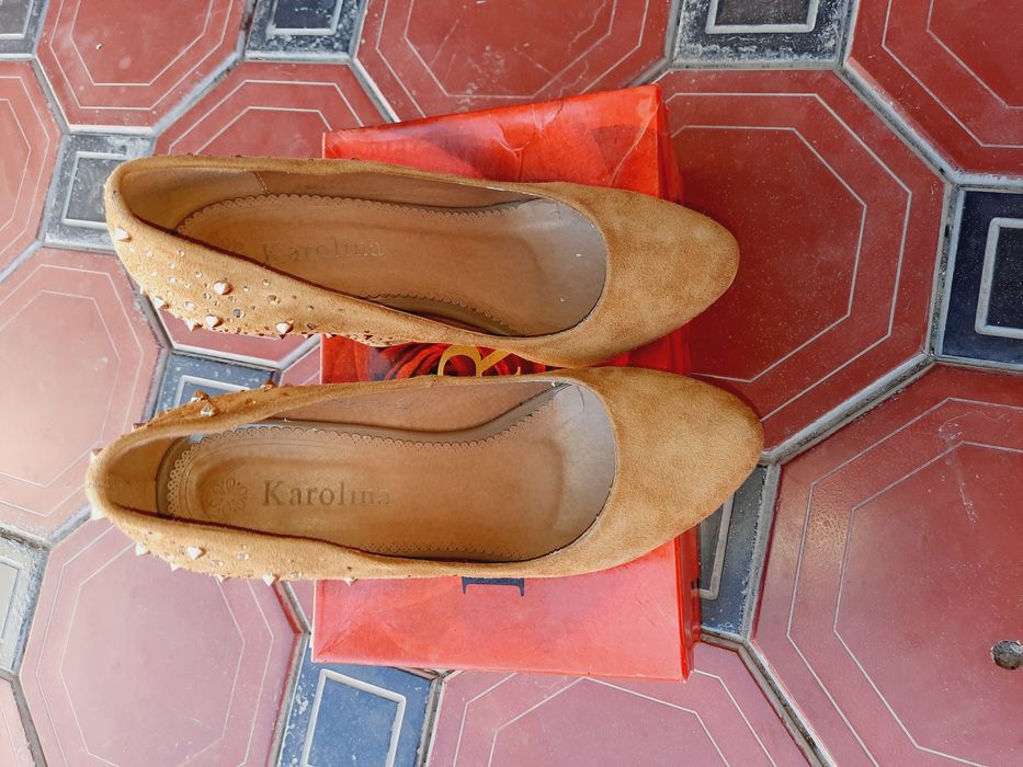 Новые и неношеные туфли