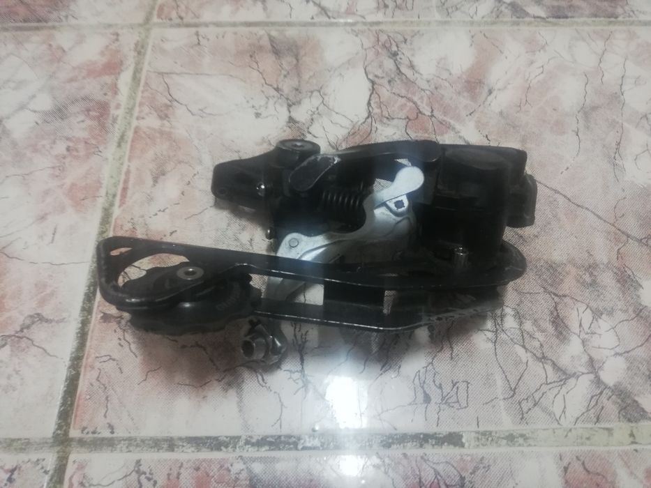 Vând schimbător pinioane shimano XT shadow