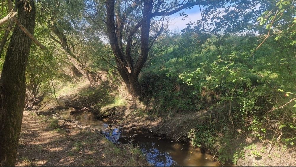 Casă nouă, teren 2200m2 în zonă liniştită şi retrasă, cu ieşire la râu