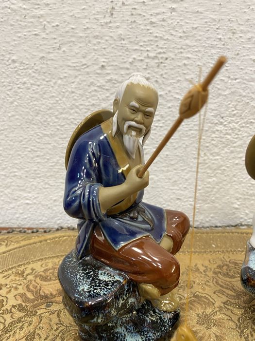 Стари азиятски фигури рибари